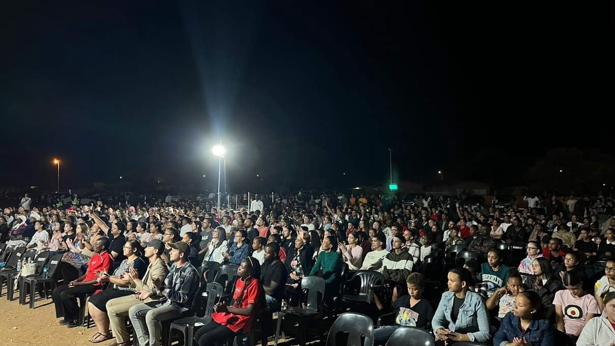 Seated congregation at a gospel crusade in Rehoboth, Namibia